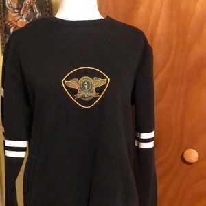 Menswear- sweatshirt logo on both sleeves, two pockets on sweat shirt front.